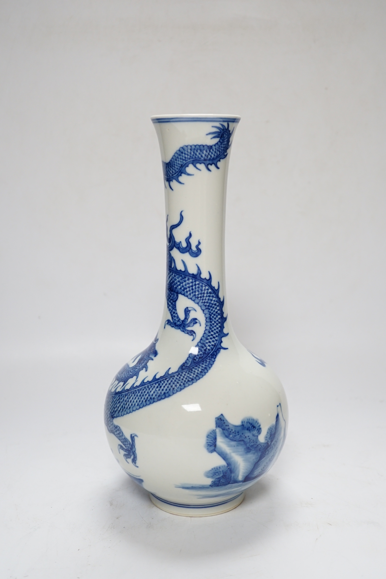 A Chinese blue and white dragon vase, 27cm high